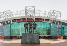Man Utd clear major land block for 100,000‑seater stadium A multi image panorama of the United Trinity statue featuring Manchester United legends George Best, Denis Law and Sir Bobby Charlton pictured at Old Trafford stadium in Manchester