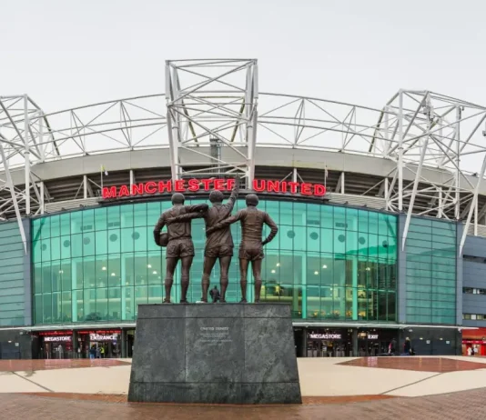Man Utd clear major land block for 100,000‑seater stadium A multi image panorama of the United Trinity statue featuring Manchester United legends George Best, Denis Law and Sir Bobby Charlton pictured at Old Trafford stadium in Manchester