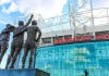 How Manchester United hit record revenue without Europe The United Trinity refers to the Manchester United trio of George Best, Denis Law, and Sir Bobby Charlton at Old Trafford stadium
