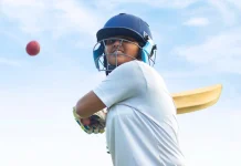 Five new cricket domes funded ahead of Women’s T20 World Cup Female Indian cricket player wearing protective gear and hitting the ball with a bat on the field