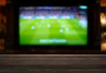 La Liga says FIFA VPN deal sends ‘disastrous message’ A big screen in the bar broadcasting football.