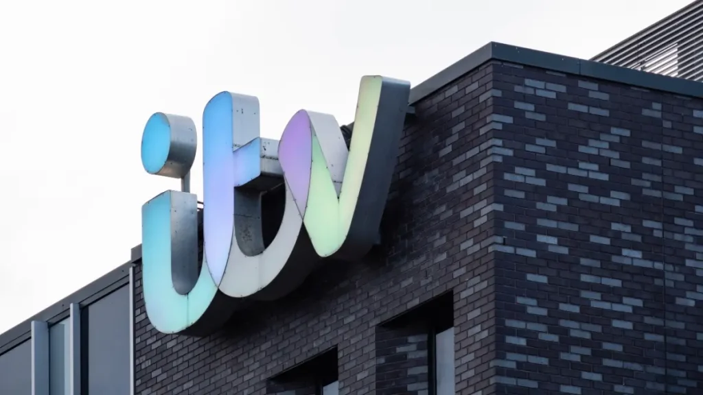 ITV sign on the outside of television station building.