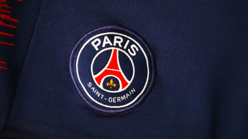 Football uniform of the Paris Saint Germain Club. Gym shorts. Logo. Shield. Soccer player. Eiffel Tower. Sportswear. PSG