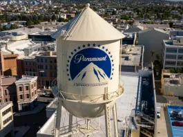 Paramount-Warner Bros merger halted for court review Los Angeles California. USA: 2025 December 9. Motion picture industry studio. Paramount Pictures, The Studios at Paramount Pictures. Aerial, water tank and tower logo.