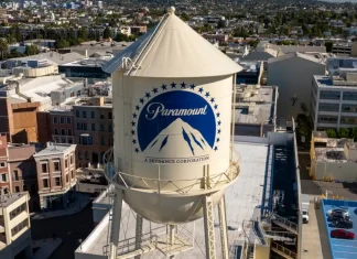 Paramount-Warner Bros merger halted for court review Los Angeles California. USA: 2025 December 9. Motion picture industry studio. Paramount Pictures, The Studios at Paramount Pictures. Aerial, water tank and tower logo.