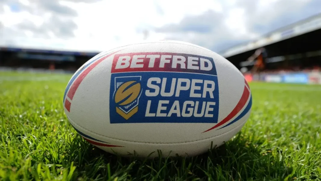 Betfred-Super-League-rugby-ball Betfred Super League rugby ball on pitch.