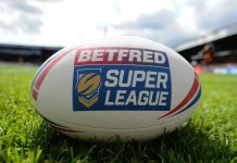 Rugby’s governing bodies face trial over brain injuries after court clears 500 claims Betfred Super League rugby ball on pitch.