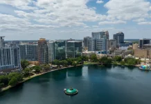 Q&A: Jason Siegel on Orlando’s winning Olympic Q-Series bid Orlando, Florida, USA - March 27th 2024: Downtown Orlando skyline overlooking the tranquil Lake Eola Park with its iconic fountain and urban backdrop.
