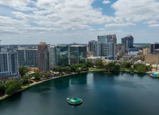 Q&A: Jason Siegel on Orlando’s winning Olympic Q-Series bid Orlando, Florida, USA - March 27th 2024: Downtown Orlando skyline overlooking the tranquil Lake Eola Park with its iconic fountain and urban backdrop.