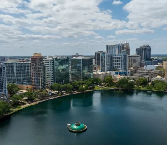 Q&A: Jason Siegel on Orlando’s winning Olympic Q-Series bid Orlando, Florida, USA - March 27th 2024: Downtown Orlando skyline overlooking the tranquil Lake Eola Park with its iconic fountain and urban backdrop.