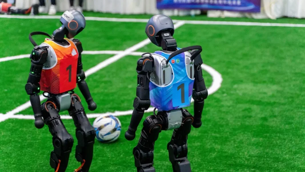 Robots-playing-football China turns humanoid robotics into spectator sport