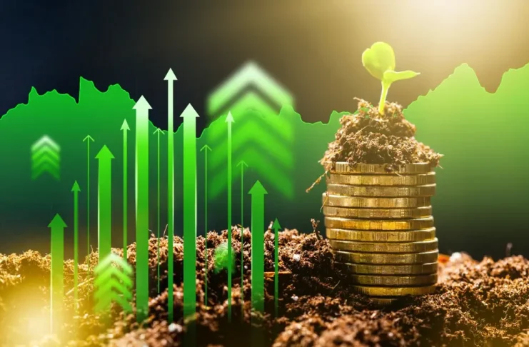 Why sustainability is a key driver of value in sports assets Coins stack with plant growing and upward arrows showing growth in finance via sustainability.