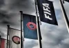 FIFA says UEFA is targeting Infantino’s re-election Budapest, Hungary - October 19, 2020: FIFA, UEFA and Hungarian Football Association flags in front of the Hungarian Football Association headquarters building in Budapest, Hungary in dramatic tone.