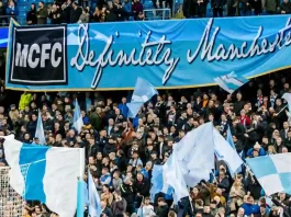 Manchester City found guilty over £900m ‘sham’ deals UNITED KINGDOM, MANCHESTER - November 21th 2017: Fans and supporters with mcfc definitely manchester banner During the Champions League match Manchester City - Feyenoord at the Etihad Stadium