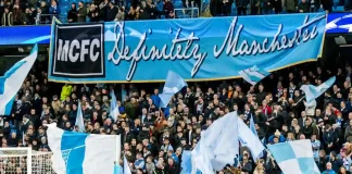 Manchester City found guilty over £900m ‘sham’ deals UNITED KINGDOM, MANCHESTER - November 21th 2017: Fans and supporters with mcfc definitely manchester banner During the Champions League match Manchester City - Feyenoord at the Etihad Stadium