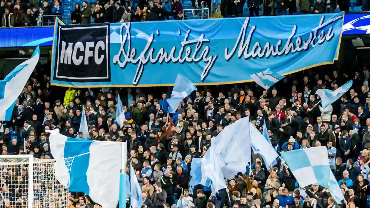 UNITED KINGDOM, MANCHESTER - November 21th 2017: Fans and supporters with mcfc definitely manchester banner During the Champions League match Manchester City - Feyenoord at the Etihad Stadium