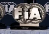 Ukraine urges FIA to act on Russian offices in Crimea Latvia, Riga 03-05.10.2025. FIA Drifting cup, two trophies sitting on top of a table covered with a white cloth In the background, there is a banner with the words FIA written on it.
