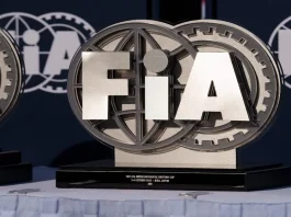 Ukraine urges FIA to act on Russian offices in Crimea Latvia, Riga 03-05.10.2025. FIA Drifting cup, two trophies sitting on top of a table covered with a white cloth In the background, there is a banner with the words FIA written on it.