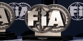 Ukraine urges FIA to act on Russian offices in Crimea Latvia, Riga 03-05.10.2025. FIA Drifting cup, two trophies sitting on top of a table covered with a white cloth In the background, there is a banner with the words FIA written on it.