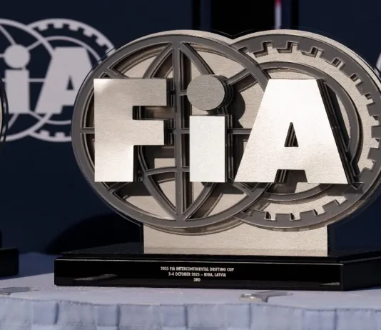 Ukraine urges FIA to act on Russian offices in Crimea Latvia, Riga 03-05.10.2025. FIA Drifting cup, two trophies sitting on top of a table covered with a white cloth In the background, there is a banner with the words FIA written on it.